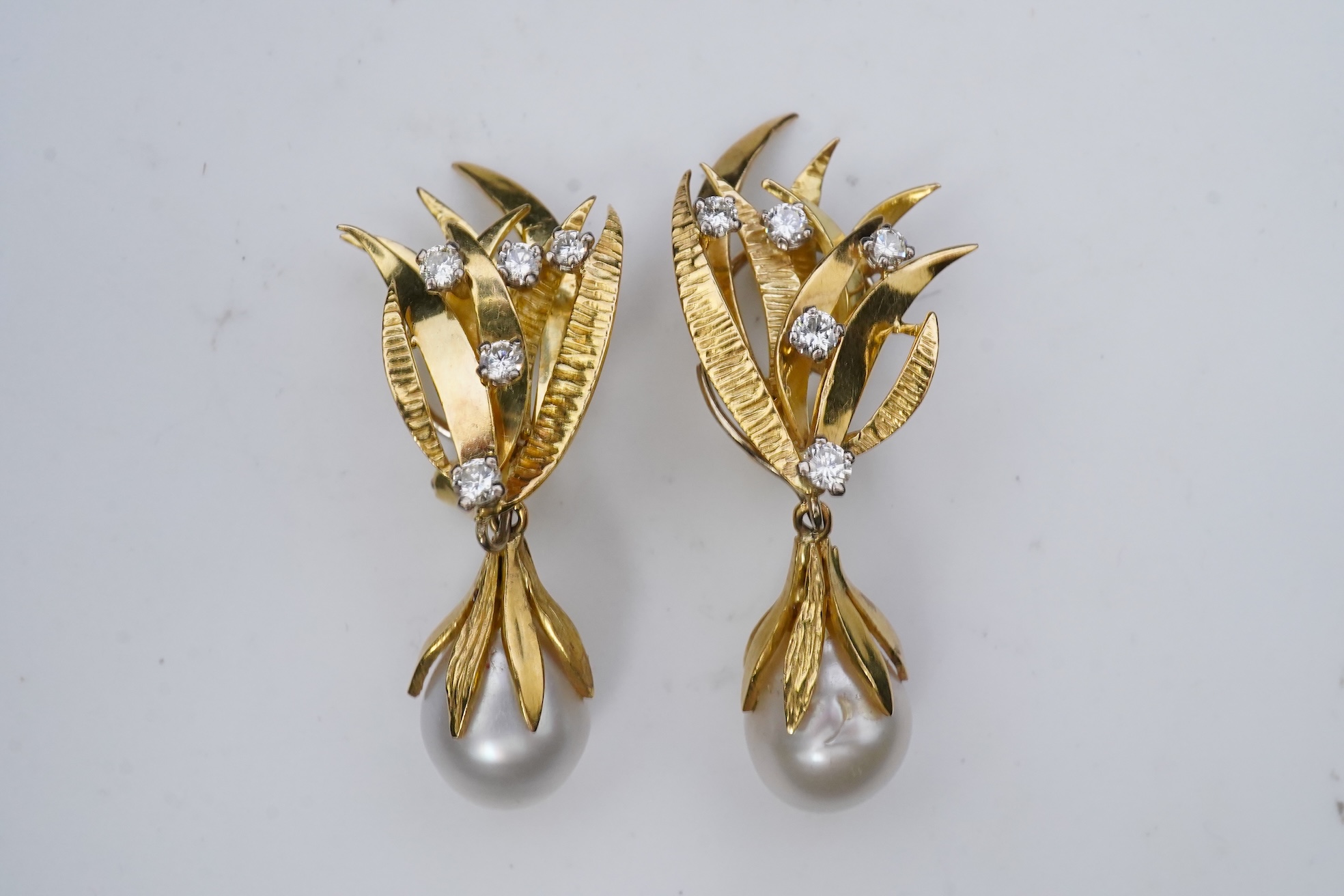 A pair of aquamarine, cultured pearl and diamond ear clips, third quarter 20th century